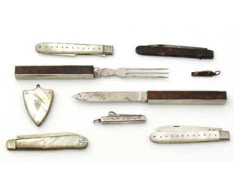 A George III silver folding fruit knife and matching fork, with mother-of-pearl sides; a silver-mounted wooden travelling kni