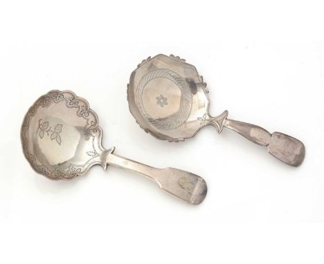 A George III silver caddy spoon, with a shaped fiddle stem and a shaped, seven-sided bowl with engraving, by Thomas James, Lo