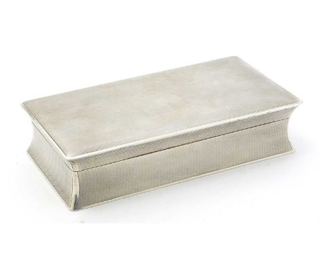 A World War II period silver cigarette box, rectangular with engine-turned decoration and concaved sides, the gilt cover inte