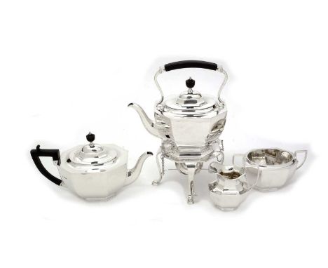 A George V silver four-piece tea set, with panelled octagonal bodies and angular handles, to include a kettle on stand with b