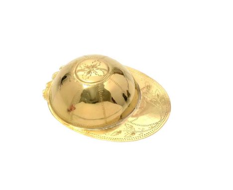 A rare George III gold jockey cap caddy spoon, with pricked borderwork and a vacant shield cartouche on the peak, unmarked, p