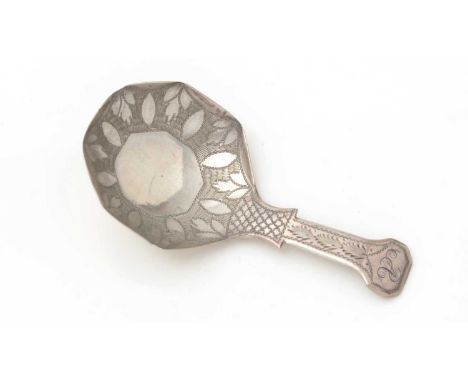 A George III silver caddy spoon, with engraved decoration, an octagonal bowl and a canted terminal, initialled, by John Lawre