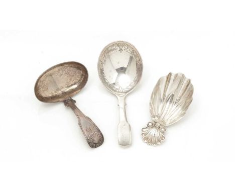 Three various George III silver caddy spoons, (one initialled "M"), by Josiah Snatt, London mixed dates 1810-1814, the longes