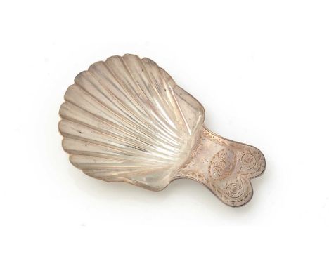 A George III silver caddy spoon, shaped like a scallop shell, with an engraved lug handle, initialled, by James Plumpton, Lon