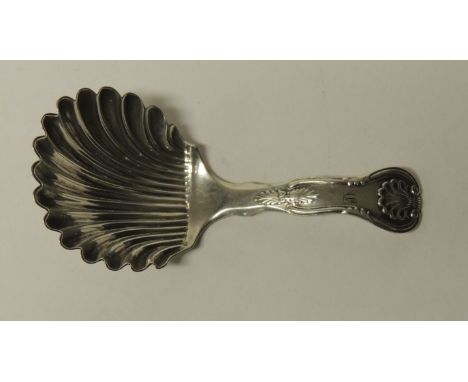 A Victorian Scottish silver caddy spoon with shell and scroll terminal and shell shaped bowl, Edinburgh 1859