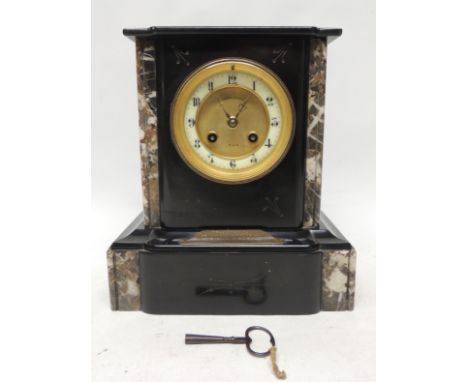 An Edwardian marble cased mantel clock by Japy et Cie, two train movement hour and half hour striking on a bell, having cream