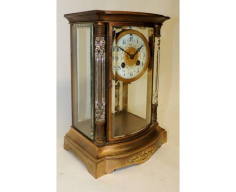 A 19th Century French Samuel Marti four glass cased mantel clock having circular cream enamel dial with floral swag detail, t