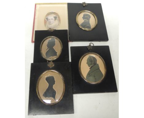 Two 19th Century cut-out silhouette portraits of ladies, each indistinctly titled beneath, in black lacquer frames with metal