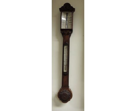 A Victorian stick barometer and thermometer by Newton & Co 3 Fleet St. London, in walnut case and with engraved ivory scales 