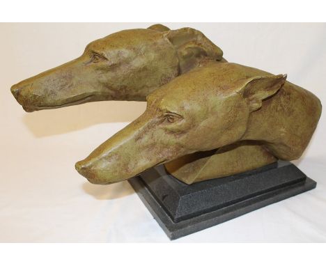 A large resin model of two Greyhounds signed M Bertin on marble base (damage to one ear)
