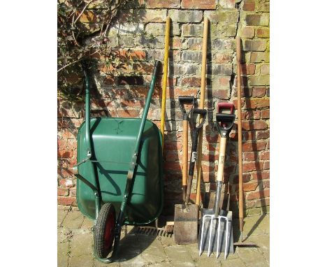 Wheelbarrow and gardening tools