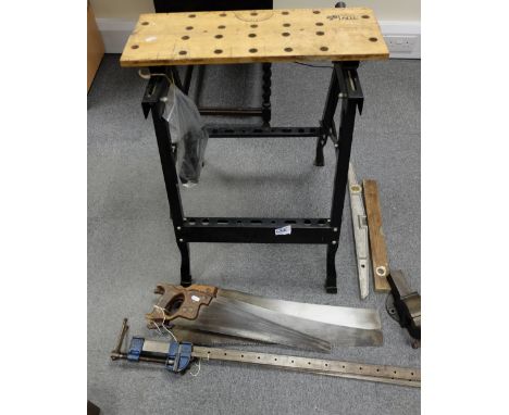 A collection of vintage wood working tools to include record sash cramps, Black and Decker work bench, record number one heav
