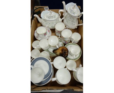 A collection of Royal Albert tea ware including Caroline Tea & Coffee pots, Petit point cups & saucers, Royal Doulton Rondela