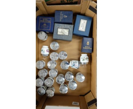 A collection of Royal Worcester Egg Coddlers (21)