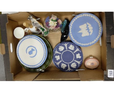 A collection of pottery to include Wedgwood jasper ware christmas plates, Portmerion plates, Poole Dolphin etc 