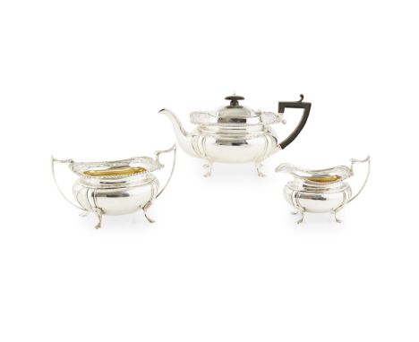 A cased three piece tea service  James Deakin &amp; Sons, Sheffield 1914, comprising a teapot, twin handled sugar basin and m