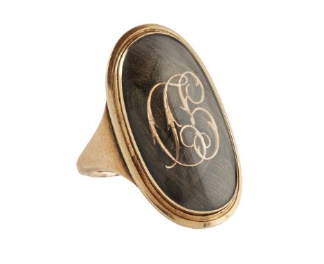 A late 18th century mourning ring, Clan McFarlane  the oval glazed panel with latticed hair and applied initials 'GD', engrav