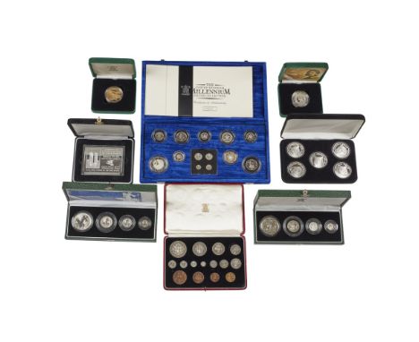 A collection of silver and other proof coins  Cased pair of silver proof crowns, Entente Cordiale (2); Cased Trafalgar silver