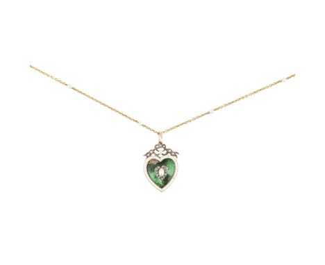 An enamel, pearl and diamond set pendant  of heart-shaped outline, the green enamelled ground in a white enamel border with a