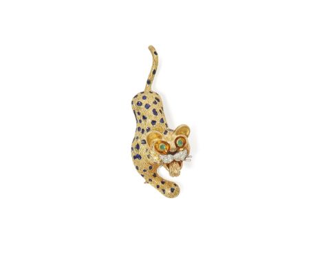 An 18ct gold multi-gem set leopard brooch, Kutchinsky  modelled in a stalking stance, the spots set throughout with blue enam