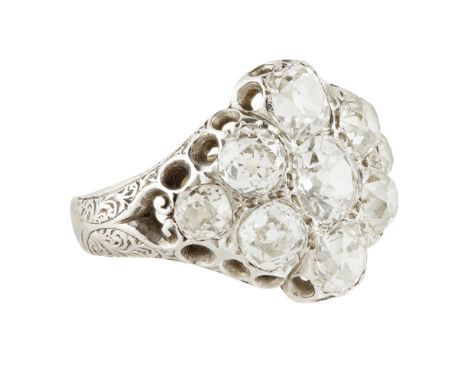 A late 19th century diamond cluster ring  set with a cluster of nine graduated old round and cushion cut diamonds, pierced de