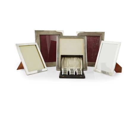 A collection of frames  to include two shagreen unmarked frames, a plain frame, two smaller unmarked engine turned decorated 