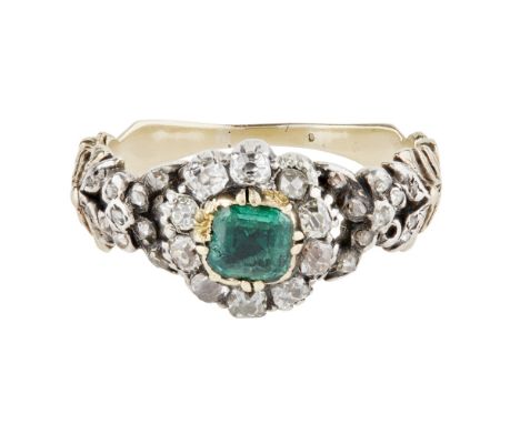 A Georgian emerald and diamond set ring  set to the centre with a square cut emerald in a border of small round cut diamonds,