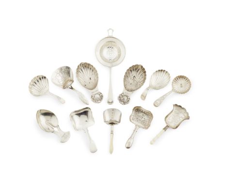 A collection of eleven caddy spoons to include;  five various Georgian shovel shaped spoons, one Samuel Pemberton, two with t