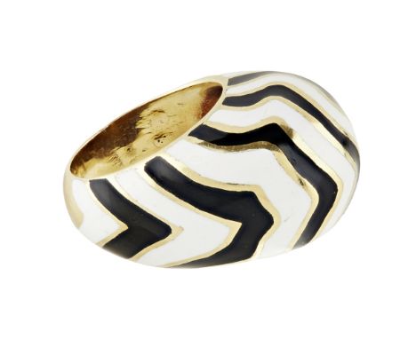 An enamel set cocktail ring  of domed design, with black and white striped enamel detail, stamped 18k  Ring size: K