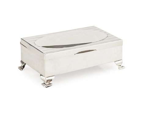 A silver jewellery box containing jewellery  A J Zimmermann, Birmingham 1913, of rectangular form, engine turned and domed li