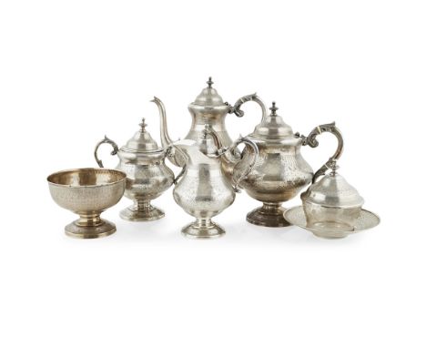 A Portuguese silver six-piece tea service  Lisbon, late 1880s, comprising a teapot, a water pot, a milk jug, a twin handled s