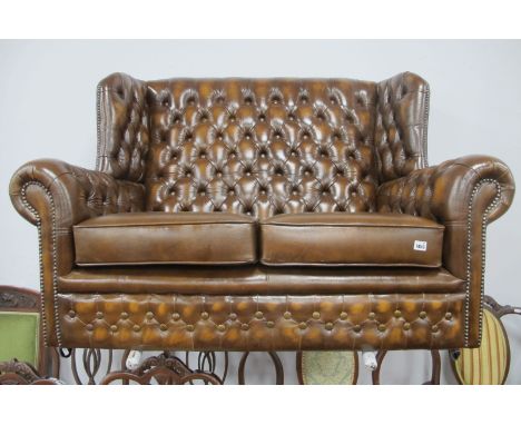 Leather Brown Button Back Two Seater Settee, with studded decoration.