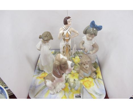 A Norcraft 'Broadway New Yorker' Figurine. Two Nao figurines (one repaired) and dog. (4)