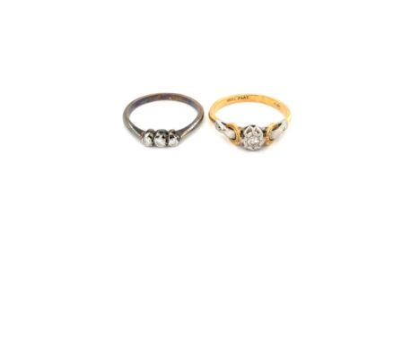 AN VINTAGE 18ct AND PLATINUM DIAMOND SINGLE STONE RING, TOGETHER WITH A 18ct AND PLATINUM THREE STONE DIAMOND RING. BOTH FING