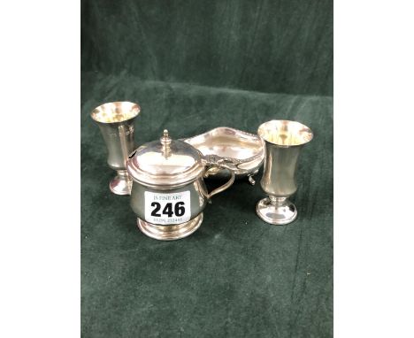A PAIR OF SILVER KIDDUSH CUPS BY A T CANNON, BIRMINGHAM 1971, A DRUM MUSTARD WITH BLUE GLASS LINER, BIRMINGHAM 1932 TOGETHER 