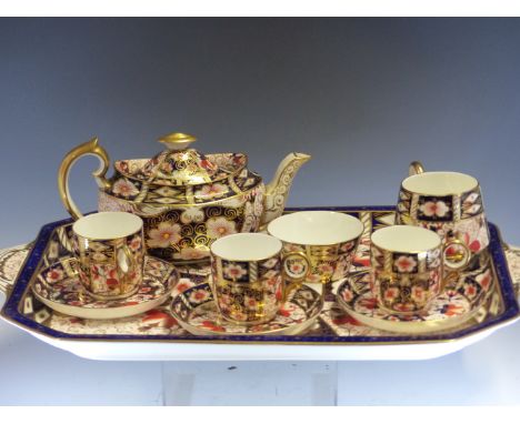 A CROWN DERBY PATTERN 2451 IMARI PALETTE CABARET SET, DATE SYMBOLS MAINLY 1895/6, COMPRISING: A TRAY, A SUGAR BOWL, A JUG, TH