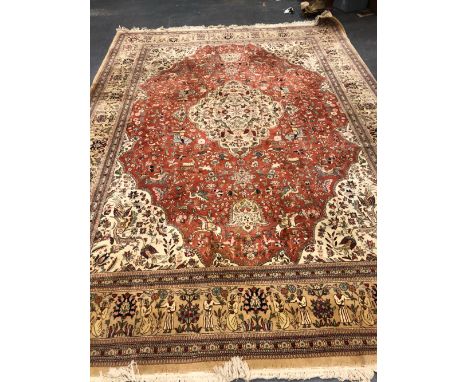 A PERSIAN TABRIZ CARPET. 380 X 260cms