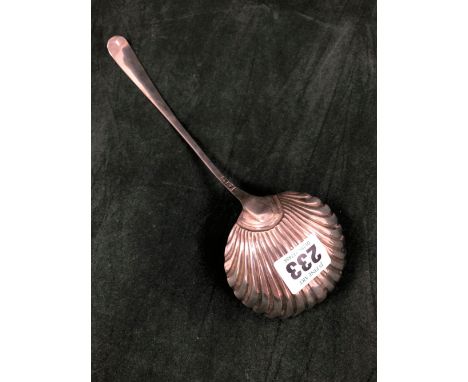 A GEORGE III SILVER SOUP LADLE, LONDON DATE LETTER OBSCURED, A SHELL BOWL TO THE BRIGHT CUT STEM, 95Gms.