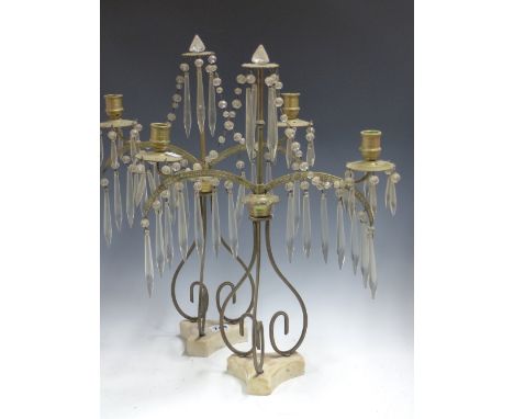 A PAIR OF 19th C. BRASS TWO LIGHT CANDELABRA, THE ARMS AND DRIP PANS HUNG WITH TORPEDO DROPS, STRINGS OF GLASS BEADS HUNG FRO