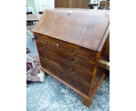 A GEORGE III FEATHER BANDED WALNUT BUREAU, THE FALL ABOVE FOUR GRADED DRAWERS AND BRACKET FEET.   W 92 x d 52 x H 104cms.