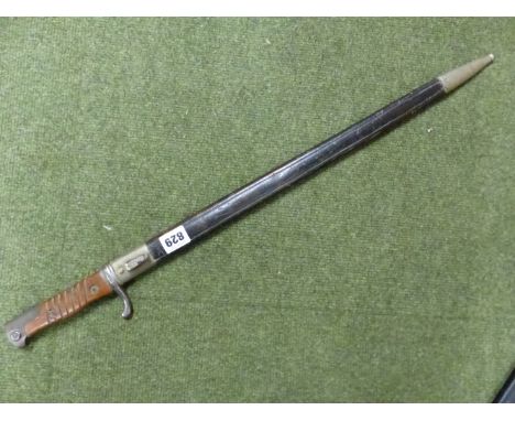 A GERMAN MODEL 1898 2ND PATTERN BAYONET, BY HANSEN, CONTAINED IN ITS STEEL MOUNTED LEATHER SCABBARD.