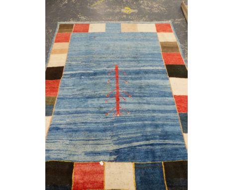 A CONTEMPORARY ORIENTAL TRIBAL CARPET. 285 x 226cms