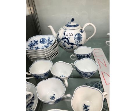 MEISSEN BLUE AND WHITE ONION PATTERN: EIGHT SAUCERS, SIX SHAPED CUPS, FOUR TEAPLATES, TEAPOT AND ONE CUP AND SAUCER