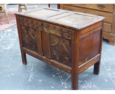 A 17th CENTURY AND LATER OAK SMALL PANEL COFFER. H 71 X W 97 X D 47cms.