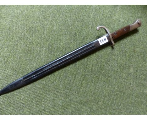 A TURKISH OR SOUTH AMERICAN MAUSER BAYONET, MARKED 4020 OVER S ON THE CROSSGUARD, CONTAINED IN ITS STEEL MOUNTED LEATHER SCAB