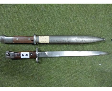 A THIRD REICH MODEL 1884/98 MAUSER BAYONET, CONTAINED IN ITS STEEL SCABBARD, TOGETHER WITH AN INDIA PATTERN MKIII BAYONET. (2