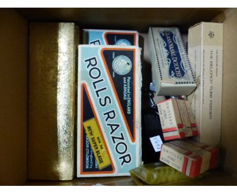 A CHROME SPECULUM, BOXES OF DUREX CORAL SUPERTRANS, TWO BOXED ROLLS RAZORS WITH TWO BOXES OF STROP DRESSING, A WILKINSON RAZO