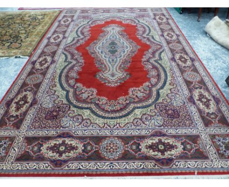 A MACHINE MADE CARPET OF PERSIAN DESIGN 485 x 299 cms