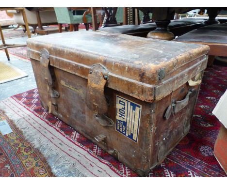 A LARGE LEATHER CABIN TRUNK. H 49 X W 88 X D 50cms.