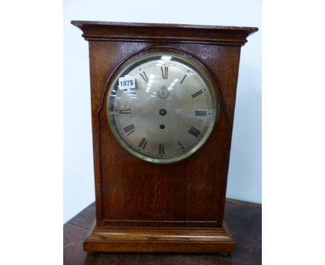 A RARE RAF OAK CASED BRACKET CLOCK BY ELLIOT LIMITED ENGLAND. 